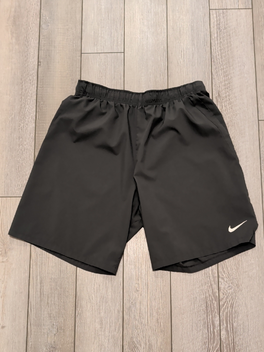 Nike Men's Black Athletic Shorts with White Swoosh
